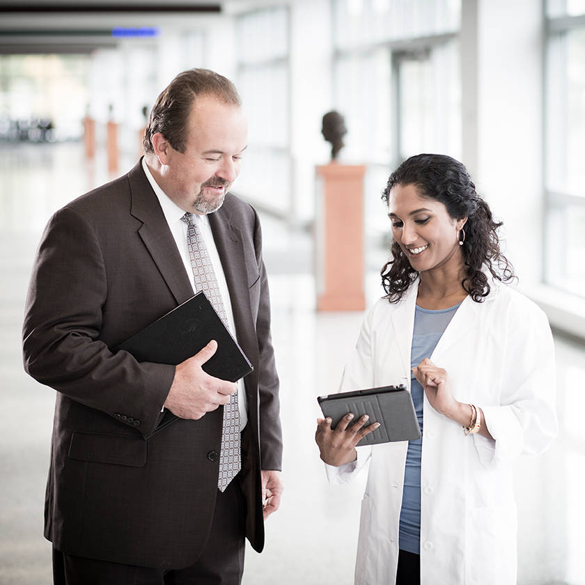 Rep meeting a medic in a hallway